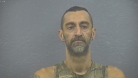 Mugshot of TRUMP, CARROLL