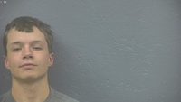 Mugshot of JARVIS, SETH